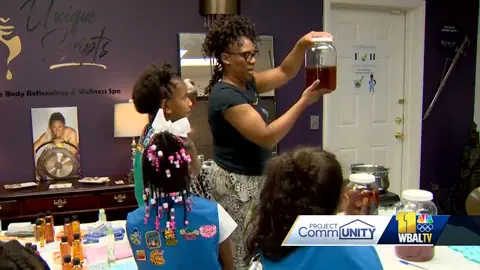 Baltimore County business owner helps Girl Scouts make herbal cold remedy kits for homeless people